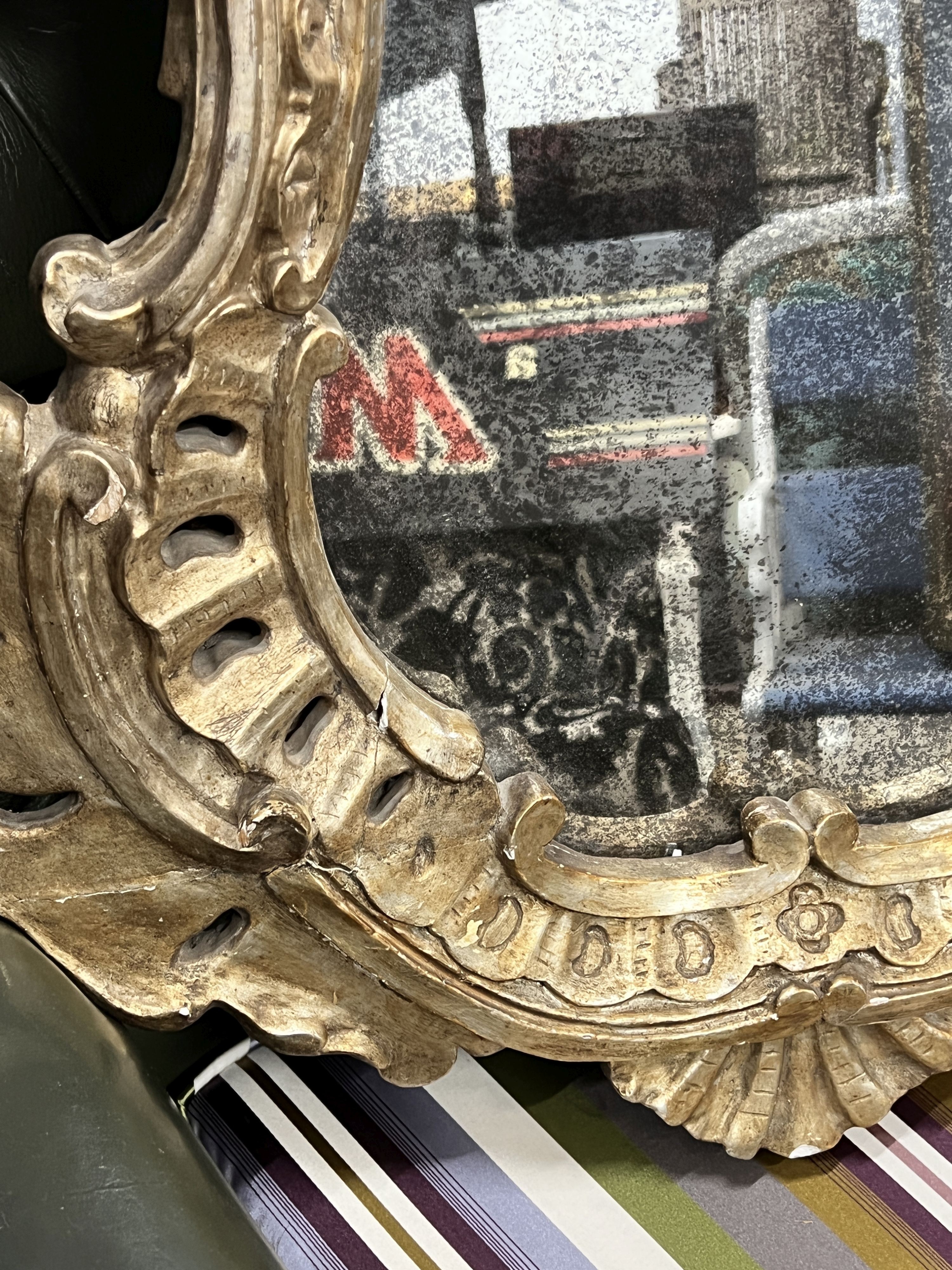 A 19th century Italian carved giltwood and gesso wall mirror, width 62cm, height 108cm
